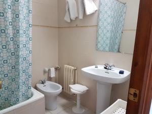 a bathroom with a sink and a toilet at Turó de L´Home in Santa María de Palautordera