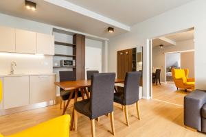 Kuchyň nebo kuchyňský kout v ubytování Apartments Bohemia Rhapsody