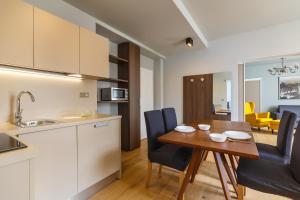 Kuchyň nebo kuchyňský kout v ubytování Apartments Bohemia Rhapsody