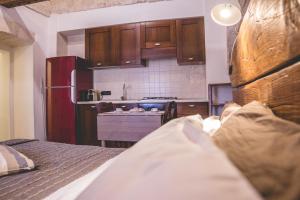 Kuchyň nebo kuchyňský kout v ubytování Trulli-eu Guesthouse Alberobello