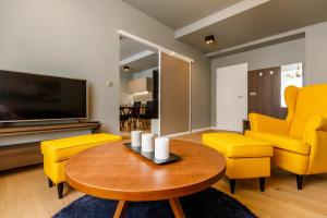 TV a/nebo společenská místnost v ubytování Apartments Bohemia Rhapsody