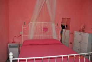 Ένα ή περισσότερα κρεβάτια σε δωμάτιο στο CASA STELLA a Palinuro "Parva sed apta mihi", Bandiera Blu anche per il 2025