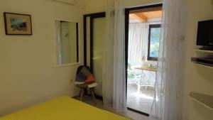 TV a/nebo společenská místnost v ubytování Guesthouse Apartment Božica