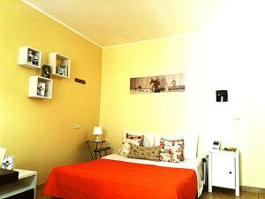 A bed or beds in a room at Superior Apartment le Case del Sole Licata