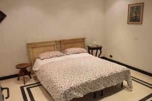 レッチェにあるMesciu Toreのベッドルーム1室(ベッド1台、枕2つ付)