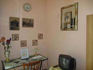 En TV eller et underholdningssystem på L'Antica Locanda