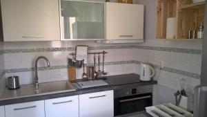 Kuchnia lub aneks kuchenny w obiekcie No.1 Apartments - Kołobrzeg Beach Centrum