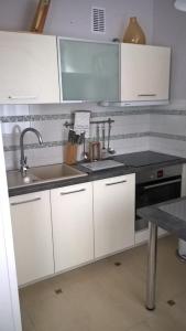 Kuchnia lub aneks kuchenny w obiekcie No.1 Apartments - Kołobrzeg Beach Centrum