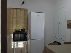 Kuchyň nebo kuchyňský kout v ubytování Seaside Villa
