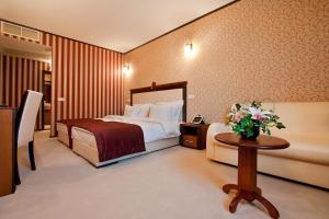 เตียงในห้องที่ Best Western Plus Bristol Hotel