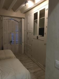 Posteľ alebo postele v izbe v ubytovaní Casa Bugambilla Cadiz
