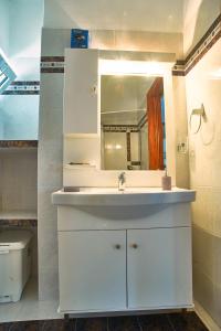 Ett badrum på Villa Aroni