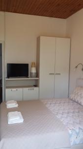 Postel nebo postele na pokoji v ubytování Apartment Dinko