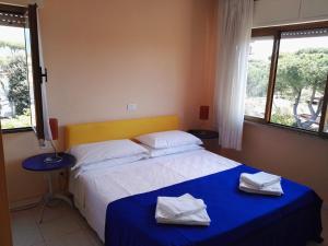 Postel nebo postele na pokoji v ubytování Hotel Elizabeth