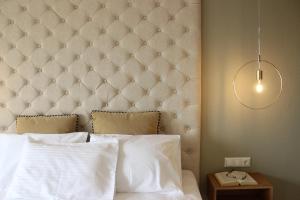 Posteľ alebo postele v izbe v ubytovaní Pinehouse King Suite