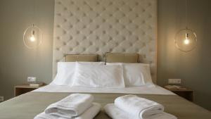 Posteľ alebo postele v izbe v ubytovaní Pinehouse King Suite