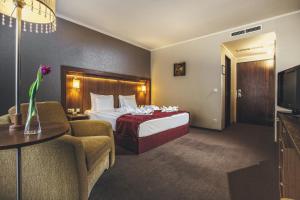 Postel nebo postele na pokoji v ubytování Caramell Premium Resort Superior