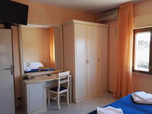 Postel nebo postele na pokoji v ubytování Hotel Elizabeth