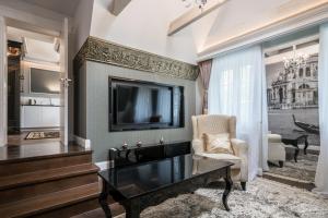 Telewizja i/lub zestaw kina domowego w obiekcie Luxury Apartments - Wroclaw Old Town - Wrocław Rynek