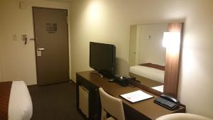 Postel nebo postele na pokoji v ubytování Hotel Ascent Plaza Hamamatsu