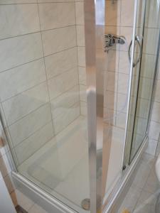 a shower with a glass door in a bathroom at Apartment Summer Paradise in Novalja +7 photos