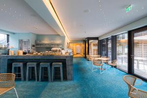 Strandhotel am Weissensee的休息区
