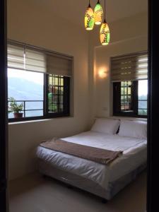 Llit o llits en una habitació de Shan Lan B&B