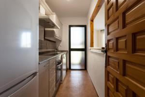 Virtuvė arba virtuvėlė apgyvendinimo įstaigoje Zahara Tropikala