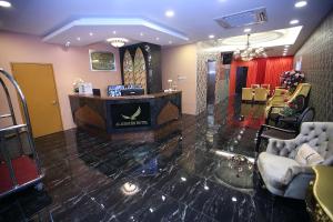 Posezení v ubytování Al Khatiri Hotel