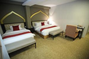 Postel nebo postele na pokoji v ubytování Al Khatiri Hotel + 37 fotografií