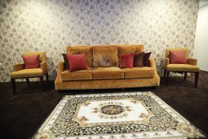 Posezení v ubytování Al Khatiri Hotel