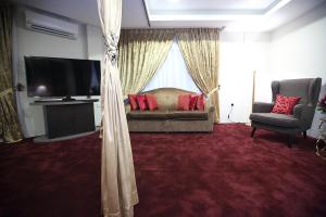 Posezení v ubytování Al Khatiri Hotel