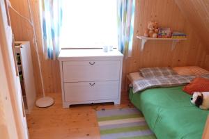 Posteľ alebo postele v izbe v ubytovaní Domek na Jagodowym Wzgórzu