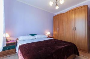 Postel nebo postele na pokoji v ubytování Apartman Sabljak