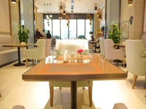 Posezení v ubytování Echarm Hotel Chengdu KuanNarrow Alley JinXianQiao Branch 宜尚酒店成都宽窄巷子金仙桥店
