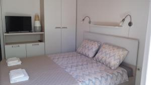 Postel nebo postele na pokoji v ubytování Apartment Dinko