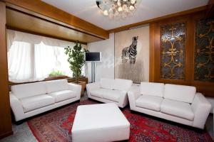 Posezení v ubytování Royal Olympic Hotel