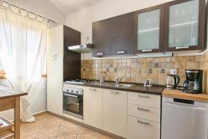 Kuchyň nebo kuchyňský kout v ubytování Istrian Villa Melany