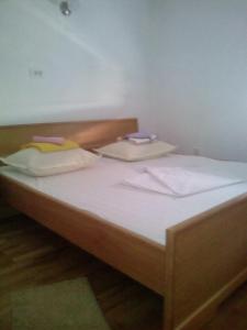 מיטה או מיטות בחדר ב-Apartment Mare