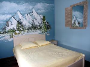 Postel nebo postele na pokoji v ubytování Hotel Champ Alsace