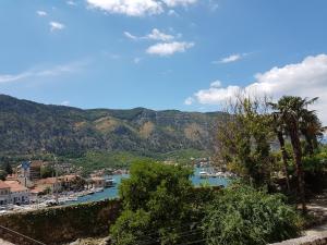 a view of a harbor with boats in the water at S&I room in Kotor +7 photos