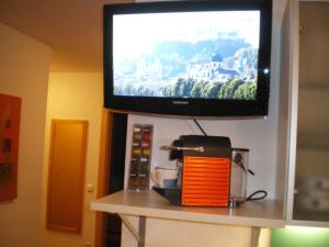TV a/nebo společenská místnost v ubytování Apartment Dahoam