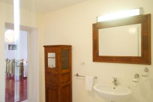 a bathroom with a sink and a mirror at Sopra il Limoneto in Cetara