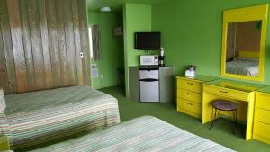 Kuchyň nebo kuchyňský kout v ubytování Caribbean Motel