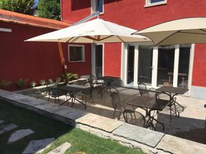 A patio or other outdoor area at Corte di Pellio
