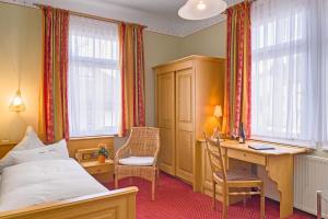 Postel nebo postele na pokoji v ubytování Dom-Hotel