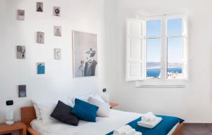 Postel nebo postele na pokoji v ubytování B&B Fuori Squadro - In Centro con Terrazza Relax vista Mare