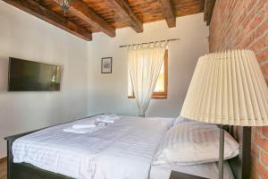 Postel nebo postele na pokoji v ubytování Istrian Villa Melany