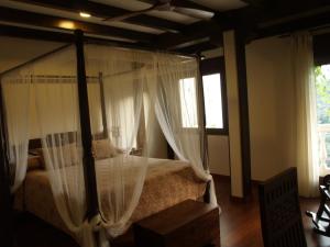 Posteľ alebo postele v izbe v ubytovaní Hostal El Cerro - Only Adults