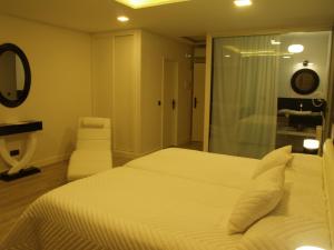 Posteľ alebo postele v izbe v ubytovaní Hostal El Cerro - Only Adults